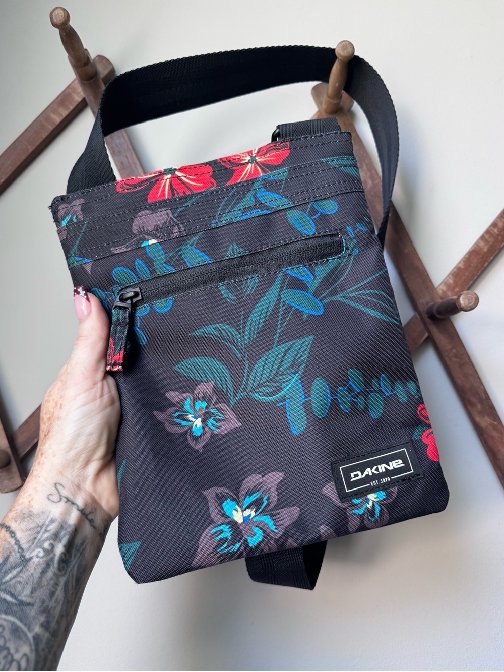 Dakine Jive Crossbody Bag In A Dark Tropical Floral Pattern